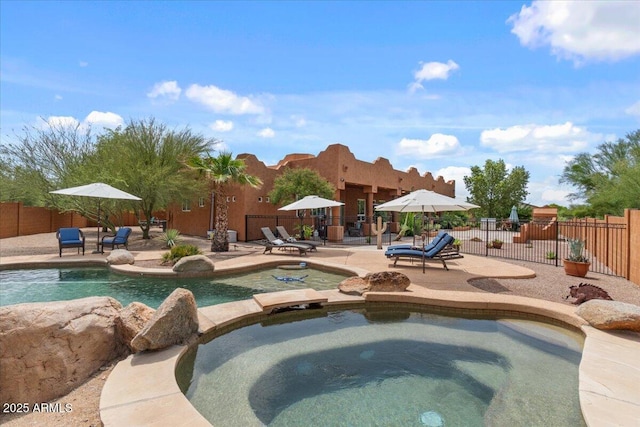 9435 E Hobart Cir, Mesa, AZ 85207 - view of pool featuring a patio, a fenced backyard, and a pool with connected hot tub