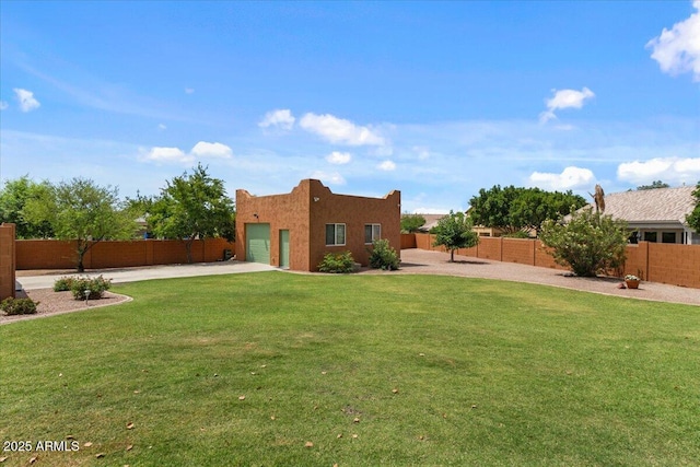 9435 E Hobart Cir, Mesa, AZ 85207 - view of yard with an attached garage and concrete driveway