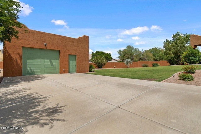9435 E Hobart Cir, Mesa, AZ 85207 - view of home's exterior featuring driveway, a garage, and stucco siding