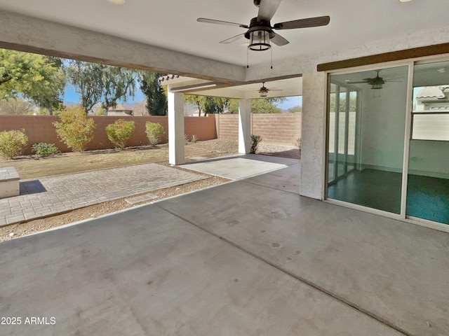 view of patio featuring ceiling fan