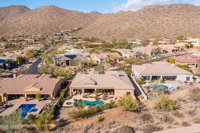 aerial view featuring a mountain view and a residential view