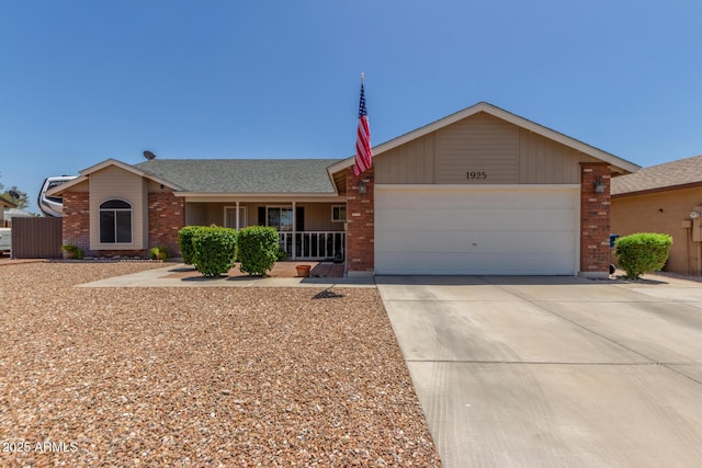 1925 W 12th Ave, Apache Junction, AZ 85120 - ranch-style house featuring brick siding, an attached garage, concrete driveway, a porch, and a shingled roof