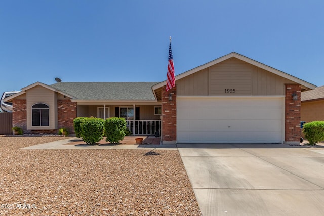 1925 W 12th Ave, Apache Junction, AZ 85120 - ranch-style home with brick siding, a garage, concrete driveway, covered porch, and roof with shingles