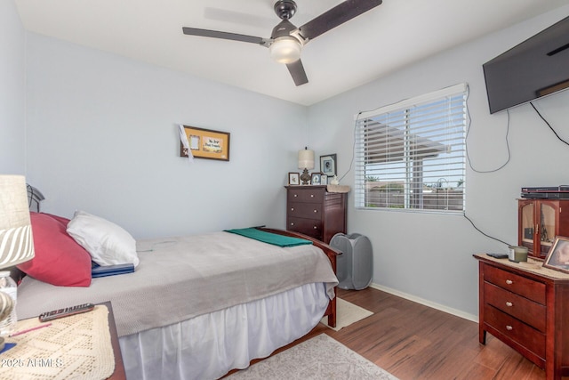 1925 W 12th Ave, Apache Junction, AZ 85120 - bedroom featuring wood finished floors and ceiling fan