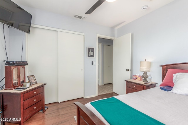 1925 W 12th Ave, Apache Junction, AZ 85120 - bedroom with light wood-style floors, a closet, and a ceiling fan