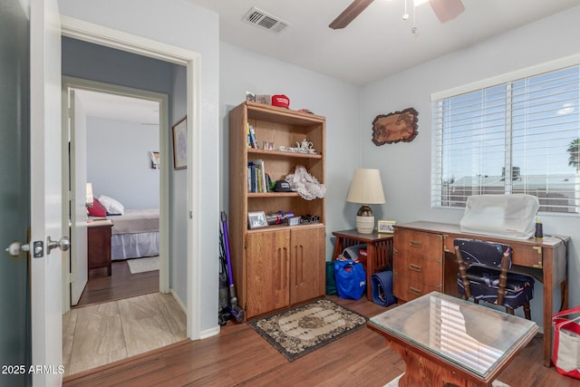 1925 W 12th Ave, Apache Junction, AZ 85120 - office area with ceiling fan and light wood-style floors