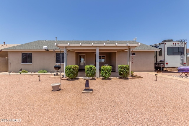 1925 W 12th Ave, Apache Junction, AZ 85120 - rear view of house featuring a patio area and stucco siding