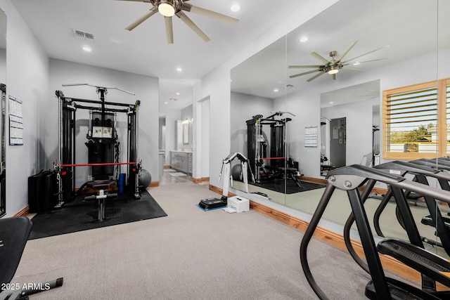 workout room featuring recessed lighting, a ceiling fan, and visible vents