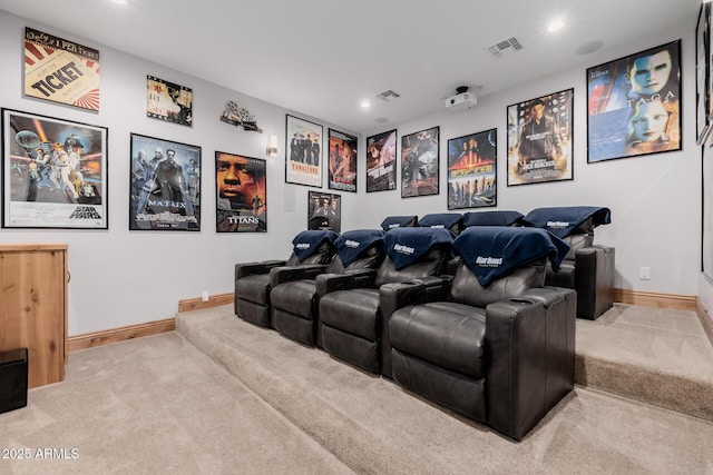 carpeted cinema room featuring recessed lighting, visible vents, and baseboards