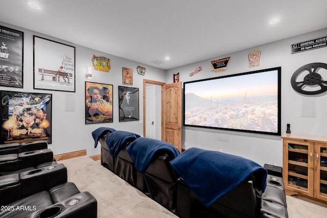 carpeted cinema with visible vents, recessed lighting, and baseboards