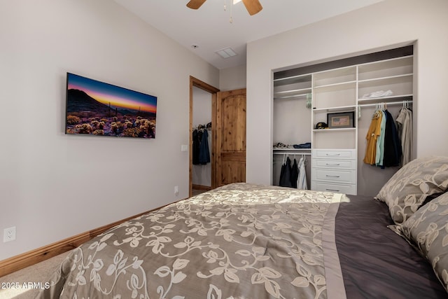 carpeted bedroom featuring a closet, baseboards, visible vents, and a ceiling fan