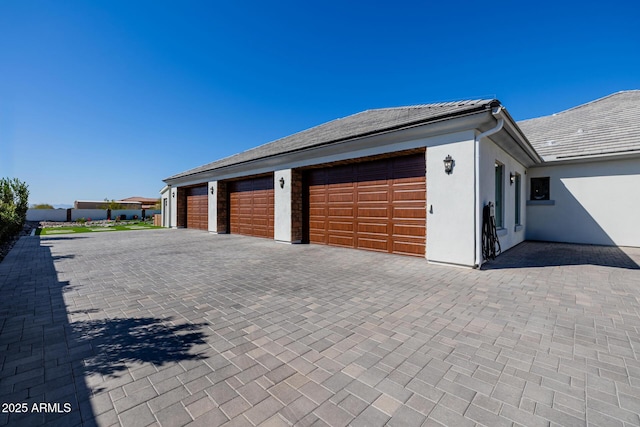 garage with driveway