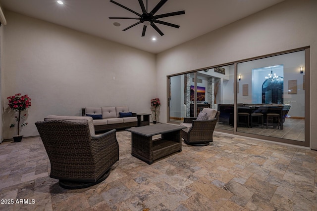 view of patio featuring a ceiling fan and an outdoor hangout area