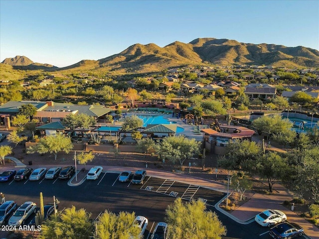 birds eye view of property with a mountain view