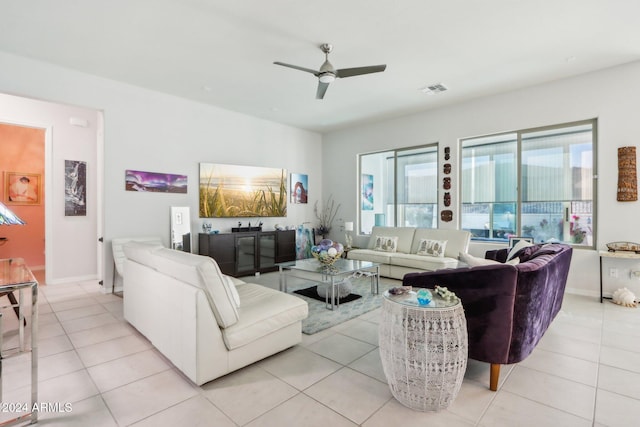 tiled living room featuring ceiling fan