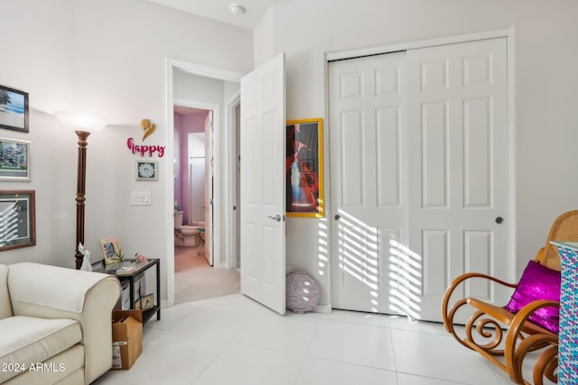 living area featuring light tile patterned floors