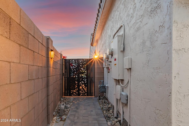 view of gate at dusk