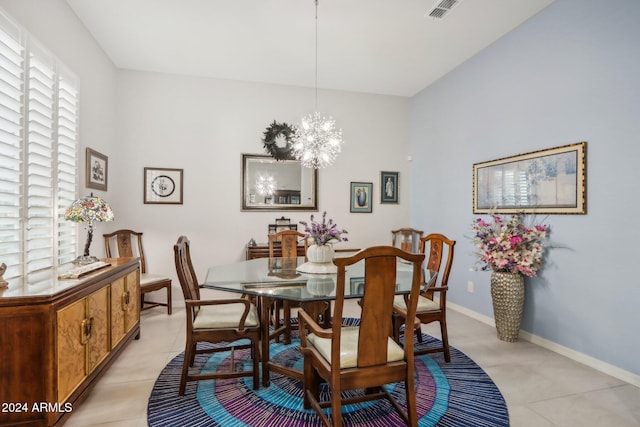 dining room featuring a notable chandelier