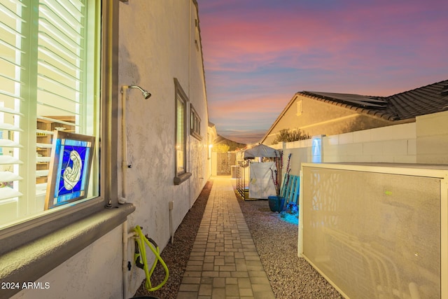 view of property exterior at dusk