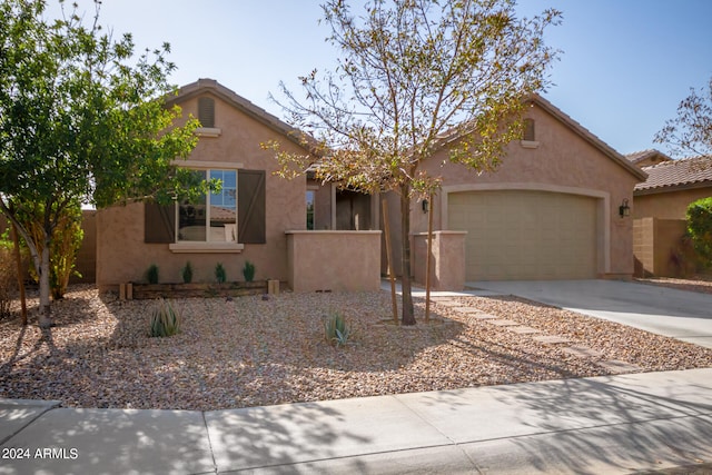 view of front of property featuring a garage