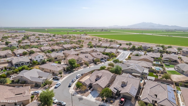 birds eye view of property featuring a mountain view