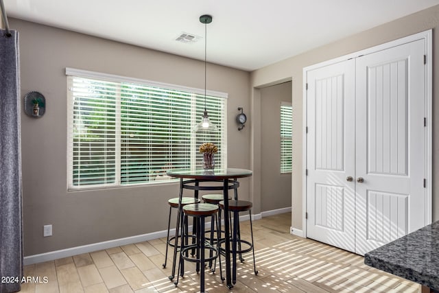 dining room with hardwood / wood-style floors