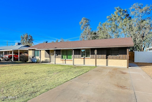 single story home with a front lawn