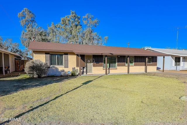 ranch-style house with a front yard