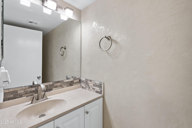4901 E Kelton Ln Unit 1052, Scottsdale, AZ 85254 - bathroom with tasteful backsplash and vanity