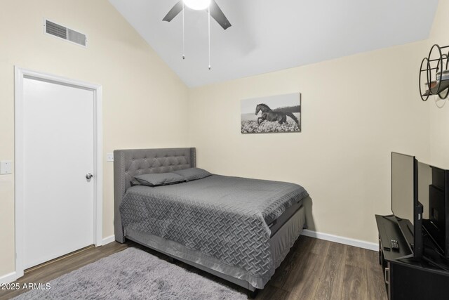 4901 E Kelton Ln Unit 1052, Scottsdale, AZ 85254 - bedroom featuring dark wood-style floors, lofted ceiling, baseboards, and a ceiling fan