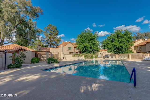 4901 E Kelton Ln Unit 1052, Scottsdale, AZ 85254 - community pool featuring fence, a patio, and a residential view