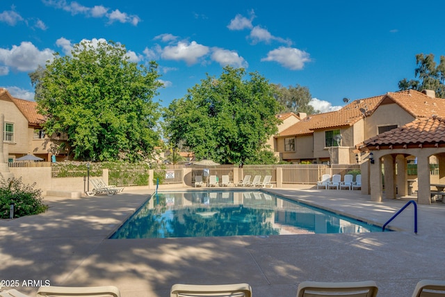 4901 E Kelton Ln Unit 1052, Scottsdale, AZ 85254 - community pool with a patio, fence, a gazebo, and a residential view