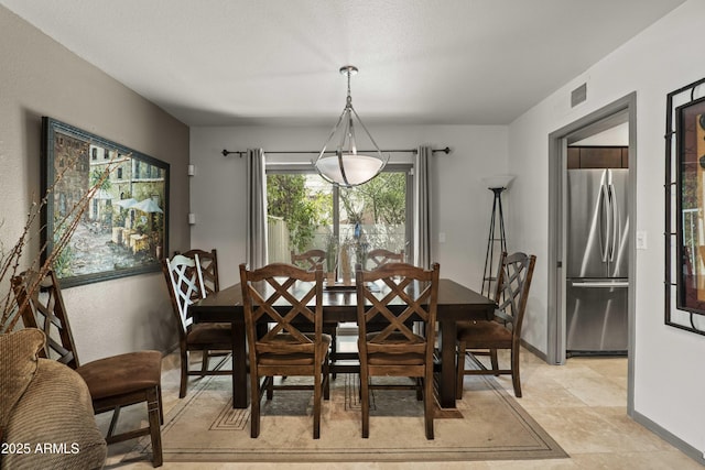 7714 N 17th Pl, Phoenix, AZ 85020 - dining room with visible vents and baseboards