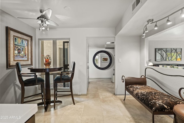 7714 N 17th Pl, Phoenix, AZ 85020 - laundry room with baseboards, ceiling fan, light tile patterned floors, and visible vents