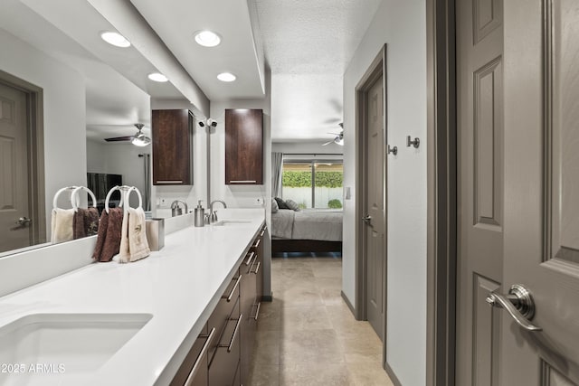 7714 N 17th Pl, Phoenix, AZ 85020 - full bathroom featuring a sink, ceiling fan, and recessed lighting