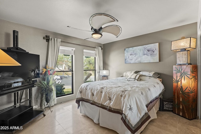 7714 N 17th Pl, Phoenix, AZ 85020 - bedroom featuring ceiling fan and tile patterned flooring