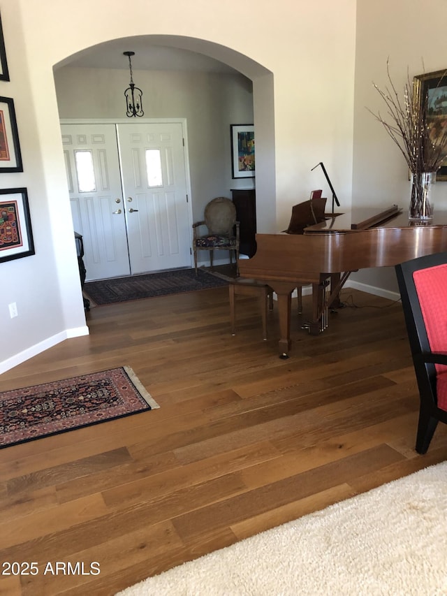 entrance foyer featuring dark wood-type flooring