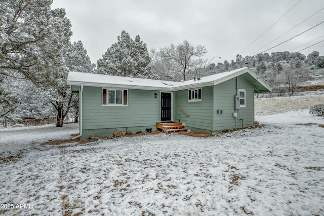 view of snow covered property