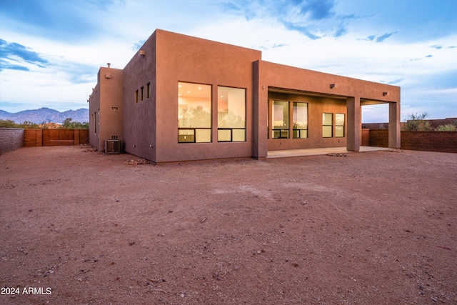 rear view of property with a mountain view