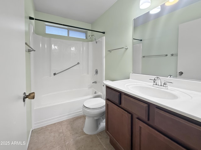 full bathroom with toilet, vanity, tile patterned flooring, and bathing tub / shower combination