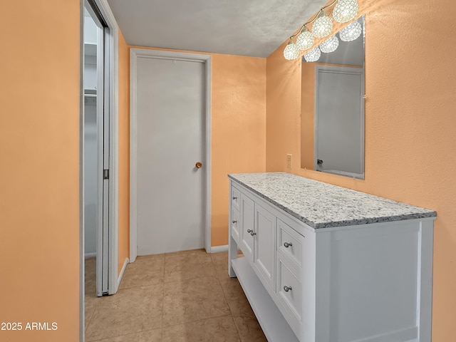 bathroom with tile patterned flooring