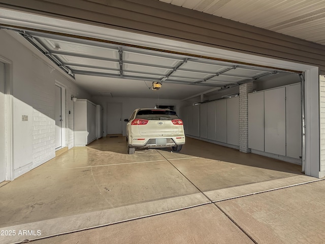 garage featuring a garage door opener