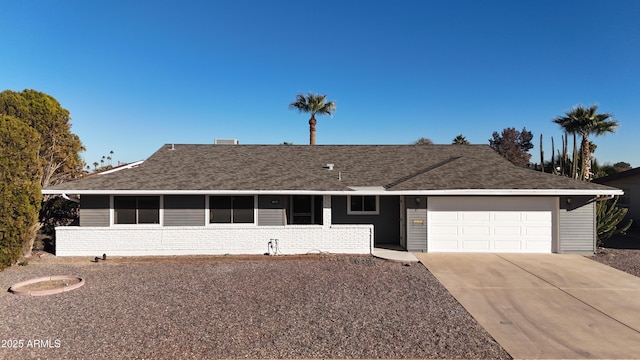 ranch-style home with a garage