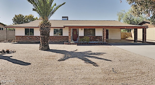 ranch-style house with a carport