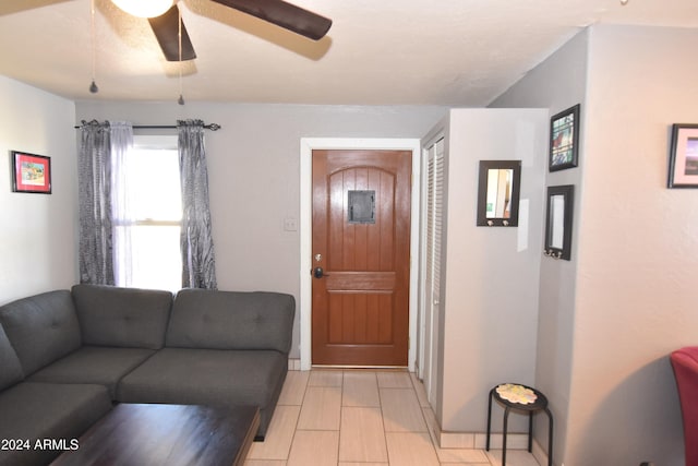 living room featuring ceiling fan