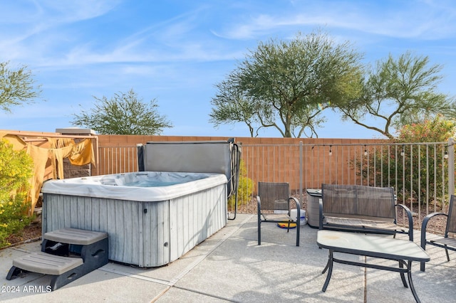 view of patio with a hot tub