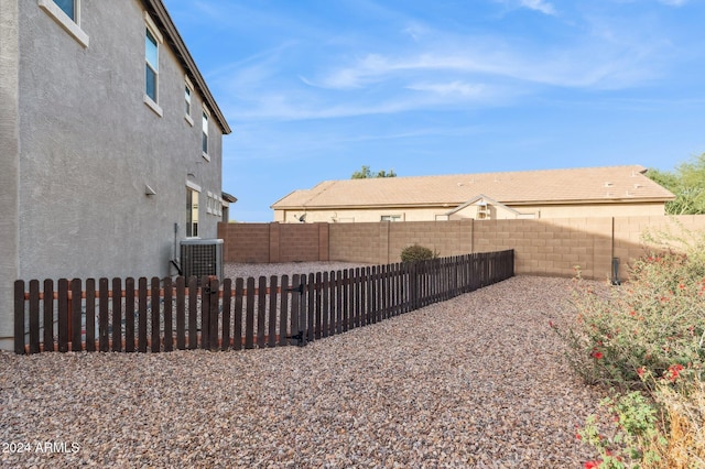 view of yard featuring central AC