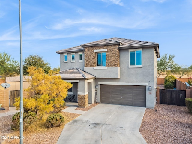 view of front of home with a garage