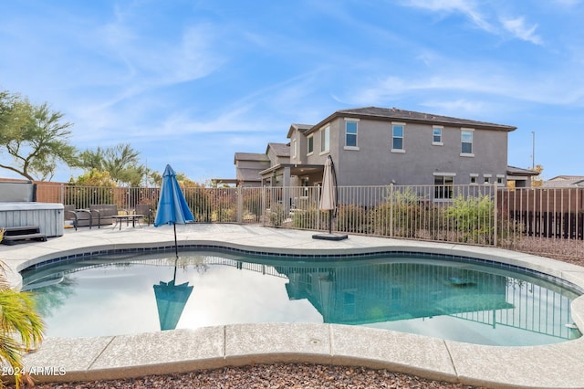 view of pool featuring a patio