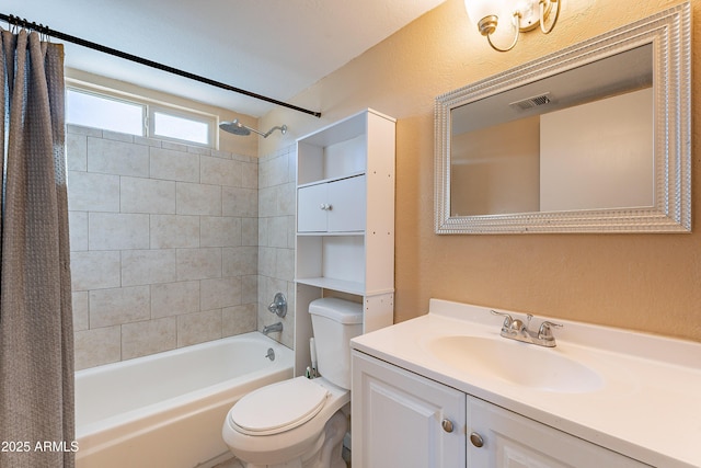 full bathroom with shower / bath combination with curtain, toilet, and vanity